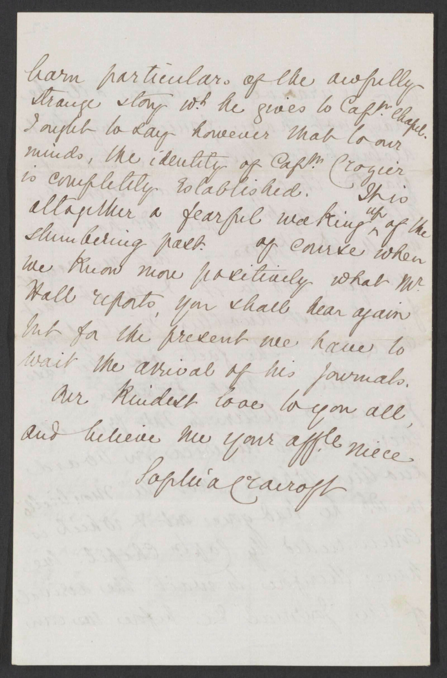 A handwritten letter on white paper with cursive text