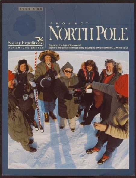 A group of people in warm clothing celebrating at the North Pole, snow all around