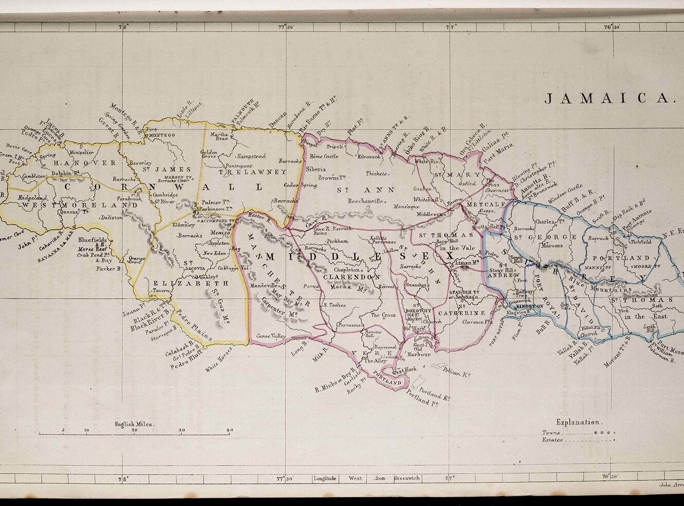 A historical map of Jamaica with colourful borders and labelled regions
