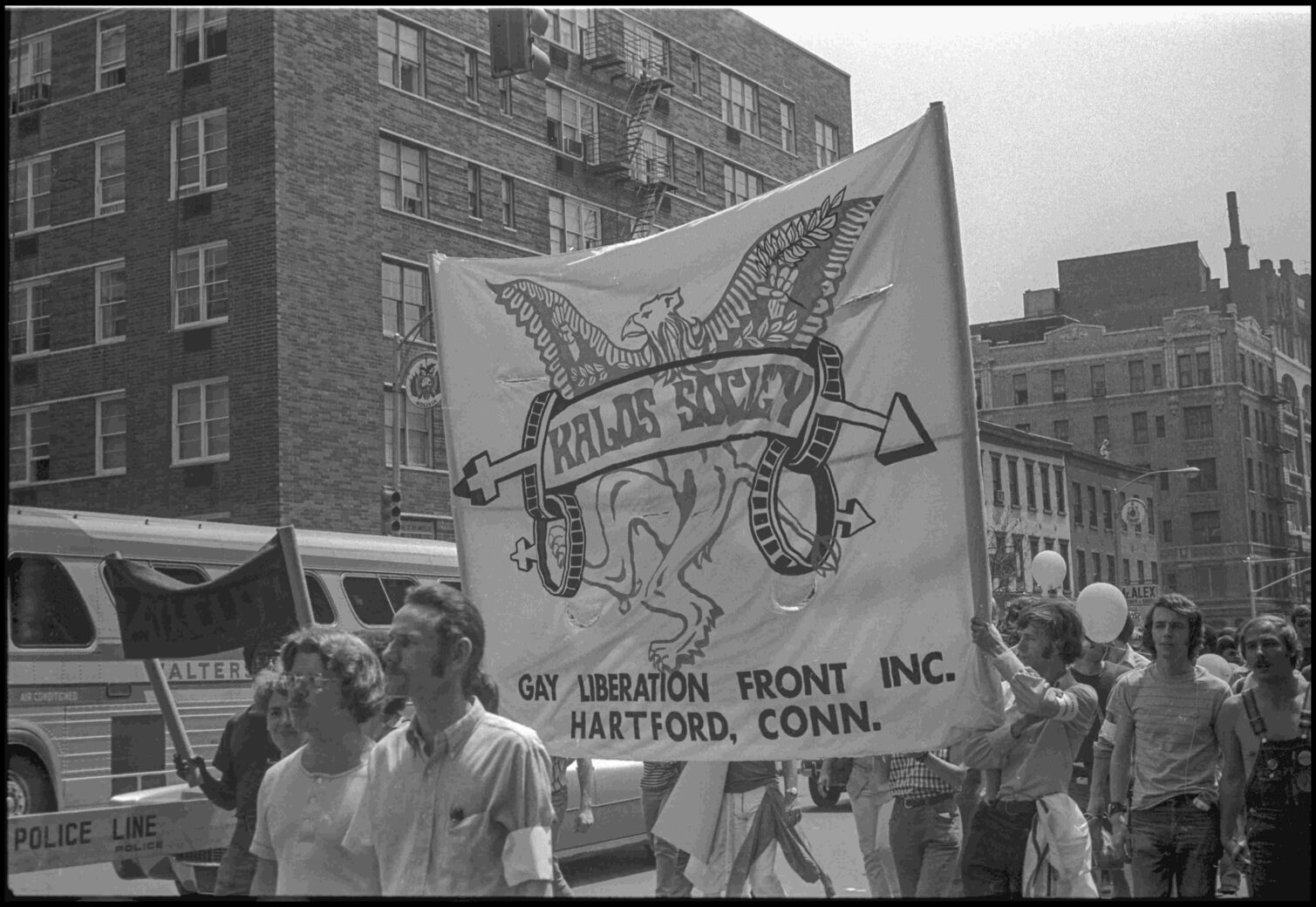 Marchers holding a banner for the Gay Liberation Front, Hartford, Conn., during a parade