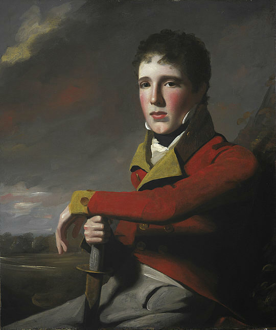 A young boy wearing a red military coat, resting his arm on a sword, with a cloudy background.