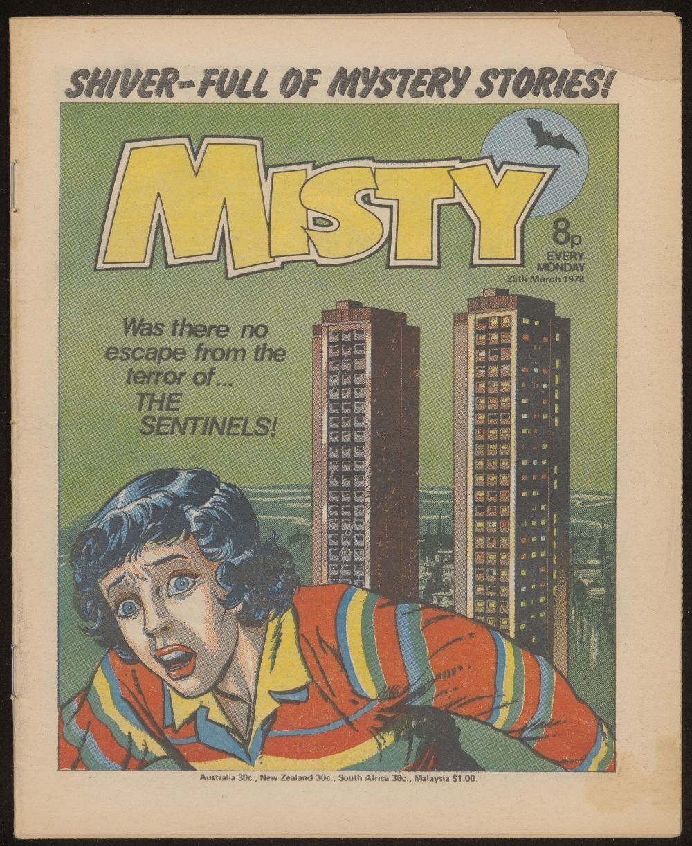 Comic cover of Misty, featuring a scared girl in a striped shirt, tall buildings, and text about mystery stories.