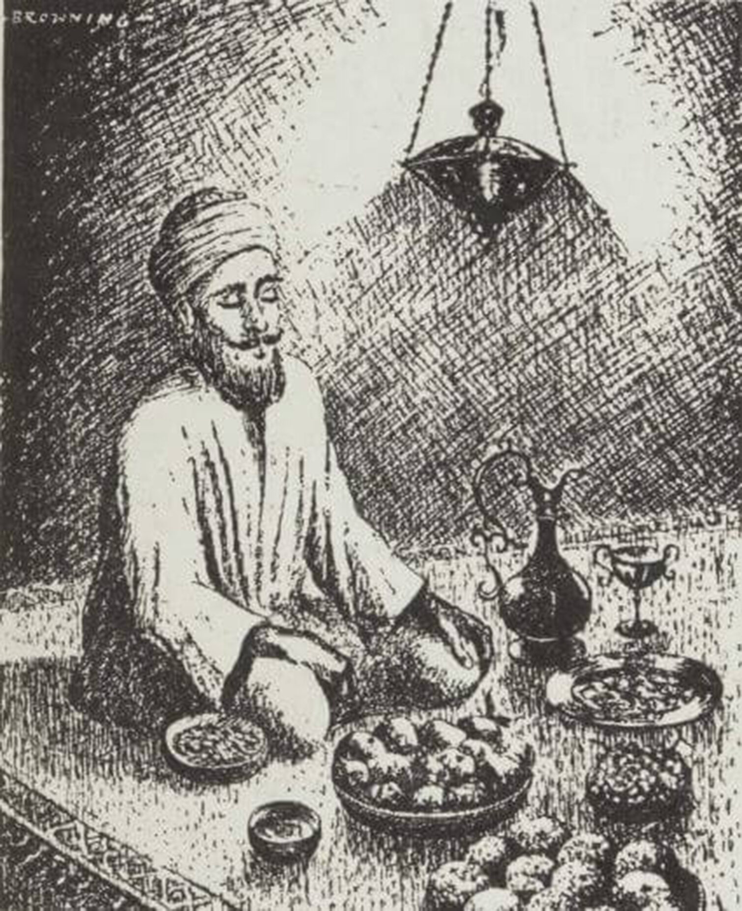 A man in traditional clothing sitting at a table with various foods and a lantern overhead