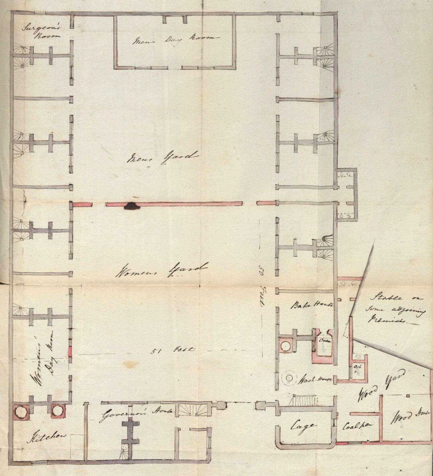 A floor plan of a building featuring rooms, corridors, and marked areas