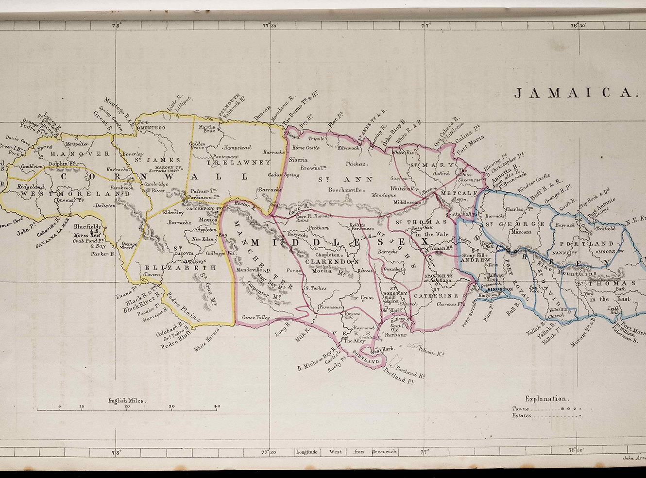 A historical map of Jamaica with colourful borders and labelled regions