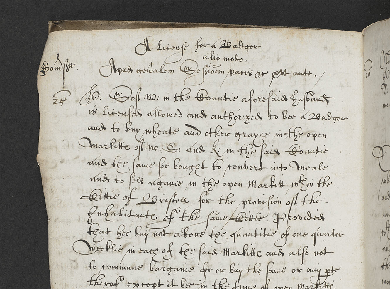 A handwritten page in an old book with cursive text and some drawings
