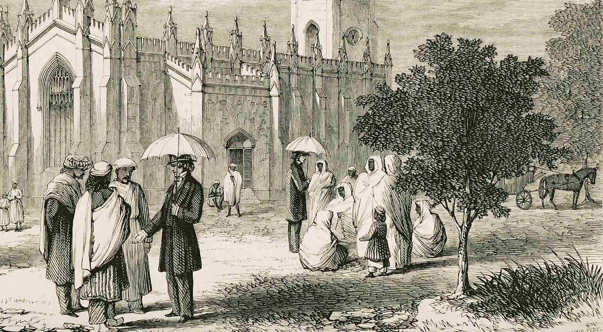 A gothic cathedral surrounded by local people and western missionaries.